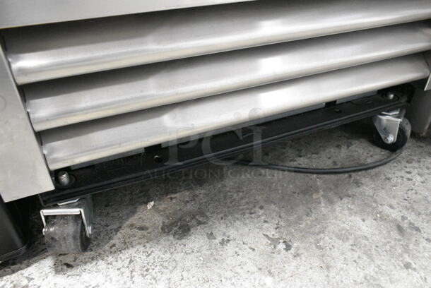 2021 True T-19F-HC Stainless Steel Commercial Single Door Reach In Freezer w/ Poly Coated Racks on Commercial Casters. 115 Volts, 1 Phase. Tested and Working! - Image 2 of 4