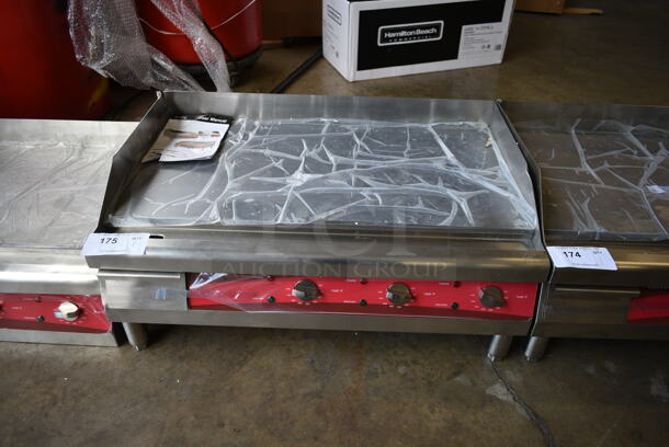 BRAND NEW SCRATCH AND DENT! 2023 Avantco 177EG24N Stainless Steel Commercial Countertop Electric Powered Flat Top Griddle. 208/240 Volts, 1 Phase.
