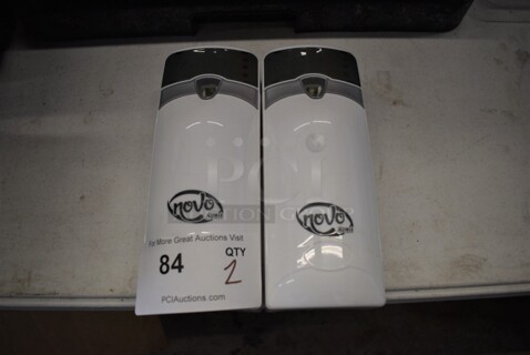 2 Noble Novo Wall Mount White Poly Units. 3.5x3.5x9. 2 Times Your Bid!