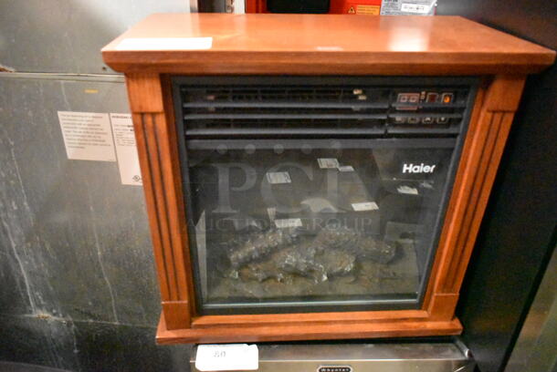 BRAND NEW SCRATCH AND DENT! Haier HHF15CPC 5,200 BTU Fireplace Infrared Zone Heater with Dark Oak Finish. 115 Volts, 1 Phase. Tested and Working! - Image 2 of 5