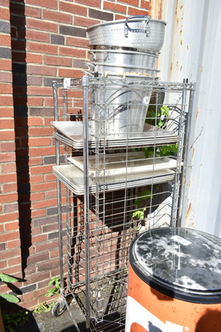 Metal Pan Transport Rack on Commercial Casters w/ Contents Including Colander and Metal Baking Pans. 