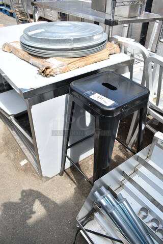 3 BRAND NEW SCRATCH AND DENT! Items; Black Bar Height Tolix Style Bar Stool, Round Metal Lids and 164TB3030 Cast Iron Table Base Plate. 3 Times Your Bid!