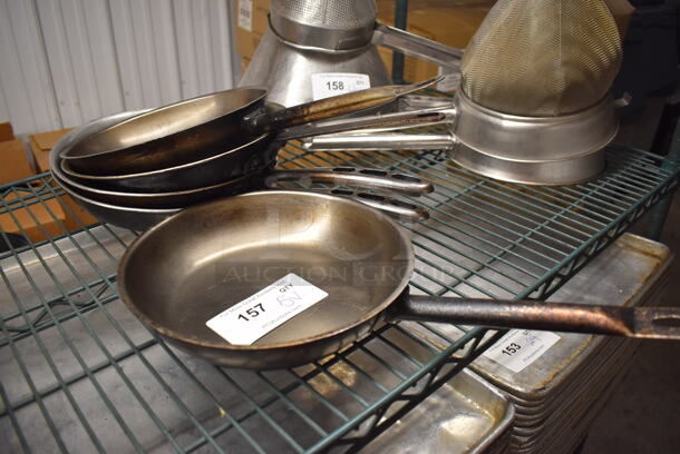 5 Various Metal Skillets. Includes 18x10x2. 5 Times Your Bid!