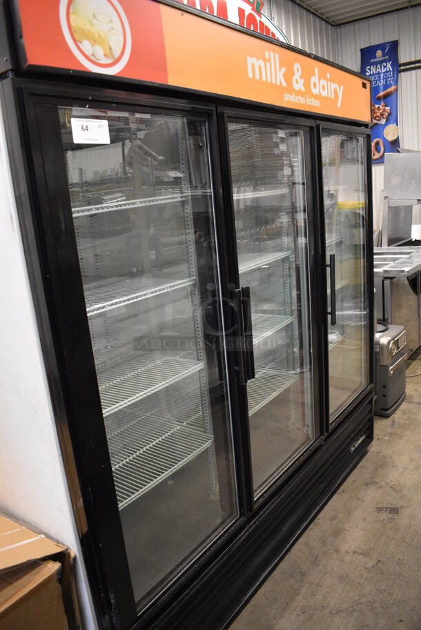 True Model GDM-72 Metal Commercial 3 Door Reach In Cooler Merchandiser w/ Poly Coated Rack. 115 Volts, 1 Phase. 78x32x79. Tested and Working!