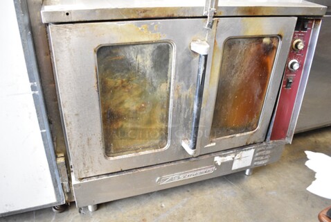Southbend Stainless Steel Commercial Natural Gas Powered Full Size Convection Oven w/ View Through Doors and Metal Oven Racks.