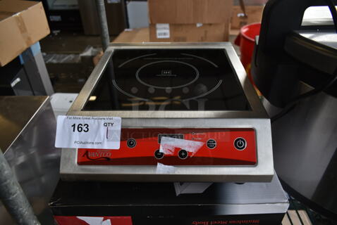 BRAND NEW SCRATCH AND DENT! 2023 Avantco 177IC3500 Stainless Steel Commercial Countertop Electric Powered Single Burner Induction Range. 208-240 Volts, 1 Phase. 