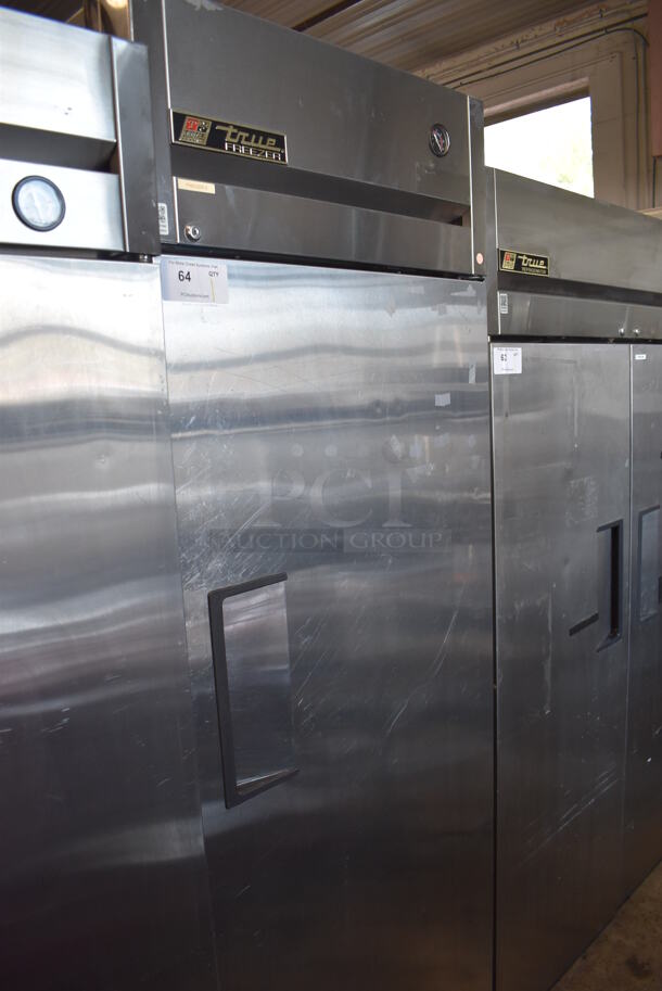 2011 True TG1F-1S ENERGY STAR Stainless Steel Commercial Single Door Reach In Freezer w/ Poly Coated Racks on Commercial Casters. 115 Volts, 1 Phase. Tested and Powers On But Does Not Get Cold