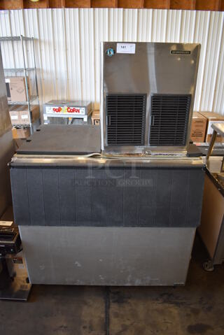 Hoshizaki F-1001MAH Stainless Steel Commercial Ice Head on Commercial Ice Bin. 208-230 Volts, 1 Phase. 49x34x73