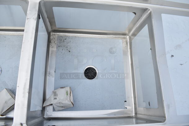 BRAND NEW SCRATCH AND DENT! Regency 600S22424224 98" 16 Gauge Stainless Steel Two Compartment Commercial Sink with Stainless Steel Legs, Cross Bracing, and 2 Drainboards - 24" x 24" x 14" Bowls. No Legs.  - Image 5 of 8