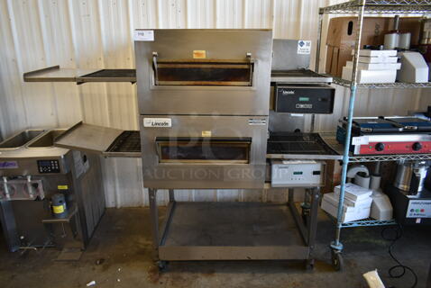 2 2016 Lincoln Impinger 1132-002-U-K1841 Stainless Steel Commercial Electric Powered Conveyor Pizza Oven on Commercial Casters. 208 Volts, 3 Phase. 2 Times Your Bid!