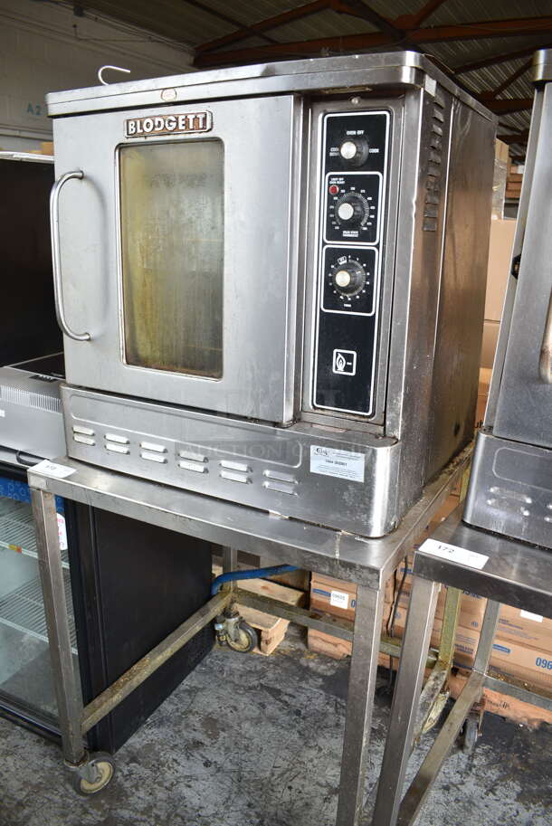 Blodgett Stainless Steel Commercial Natural Gas Powered Half Size Convection Oven w/ View Through Door, Metal Oven Racks, Thermostatic Controls and Equipment Stand on Commercial Casters.  - Image 3 of 7