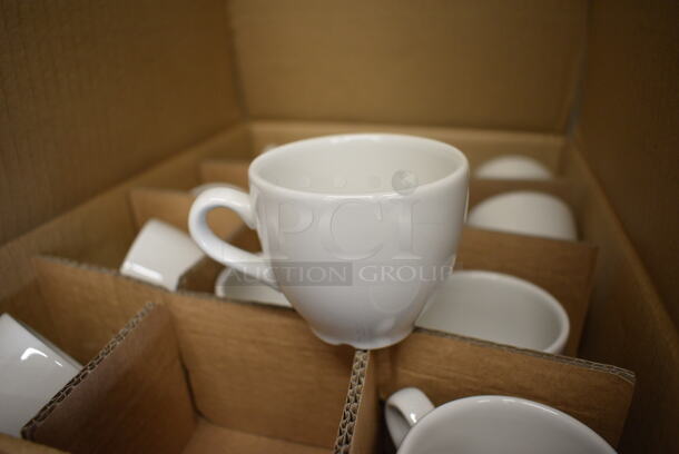24 BRAND NEW IN BOX! White Ceramic Mugs. 3.5x2.5x2.5. 24 Times Your Bid!