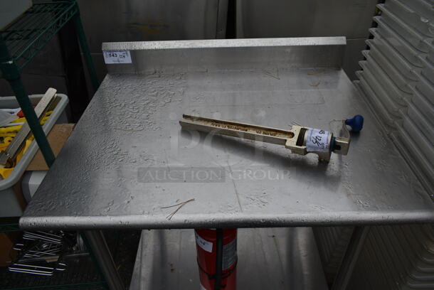 Stainless Steel Commercial Table w/ Back Splash and Under Shelf. Does Not Include Contents. - Image 2 of 3