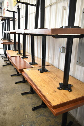16 Wooden Tables Including 9 Dining Height and 7 Bar Height. 16 Times Your Bid!