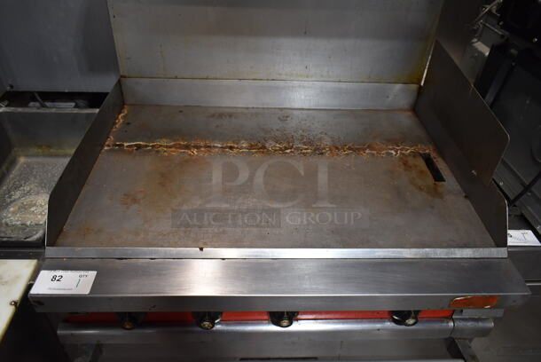 Vulcan 36XTL-559 Stainless Steel Commercial Propane Gas Powered Flat Top Griddle w/ Oven, Over Shelf and Back Splash on Commercial Casters.  - Image 2 of 6