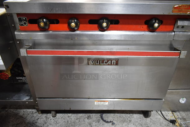 Vulcan 36XTL-559 Stainless Steel Commercial Propane Gas Powered Flat Top Griddle w/ Oven, Over Shelf and Back Splash on Commercial Casters.  - Image 3 of 6