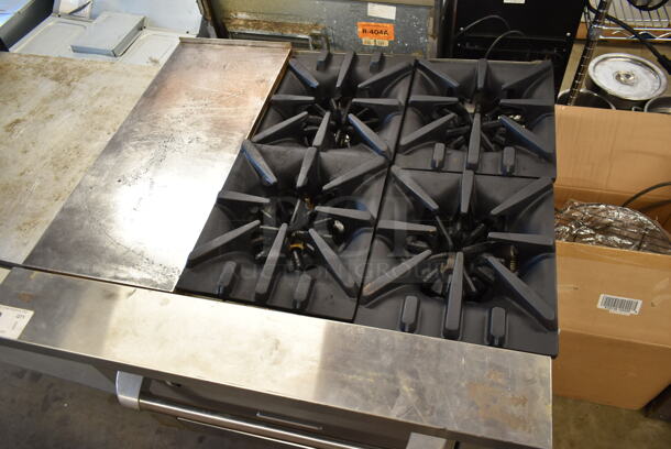 2016 Garland G36-6C Stainless Steel Commercial Natural Gas Powered 4 Burner Range w/ Left Side Flat Top and Convection Oven. - Image 2 of 7