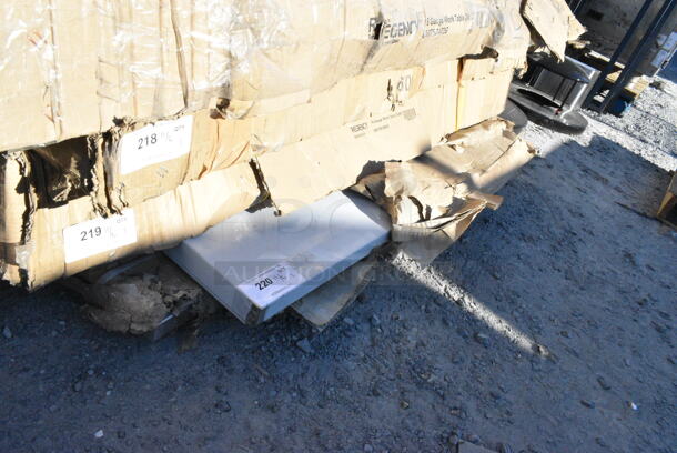 BRAND NEW SCRATCH AND DENT! Regency 600TB1860G 18" x 60" 18-Gauge 304 Stainless Steel Commercial Work Table with 4" Backsplash and Galvanized Undershelf. May Be Missing Pieces.  - Image 2 of 3