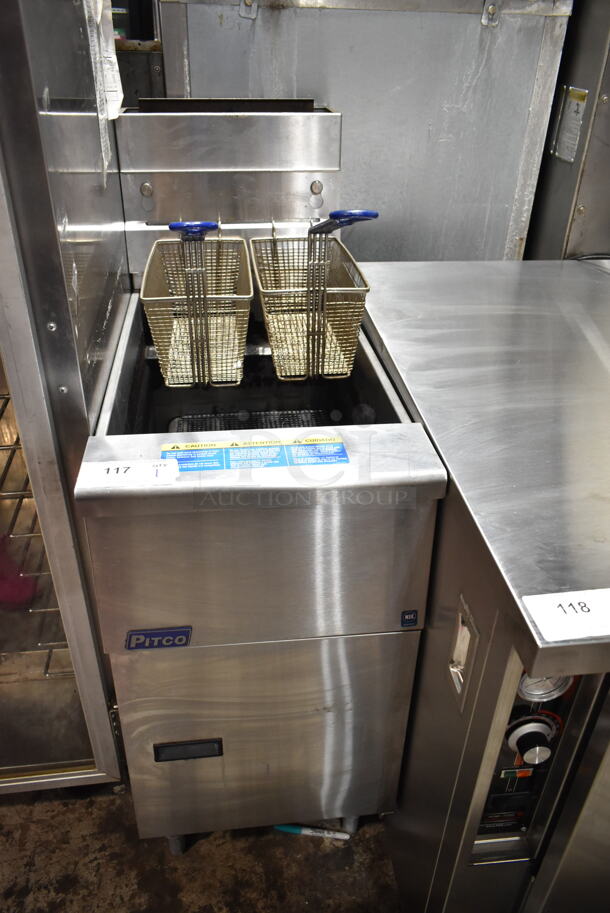 2018 Pitco Frialator SG14 Stainless Steel Commercial Floor Style Natural Gas Powered Deep Fat Fryer w/ 2 Metal Fry Baskets. 110,000 BTU. 