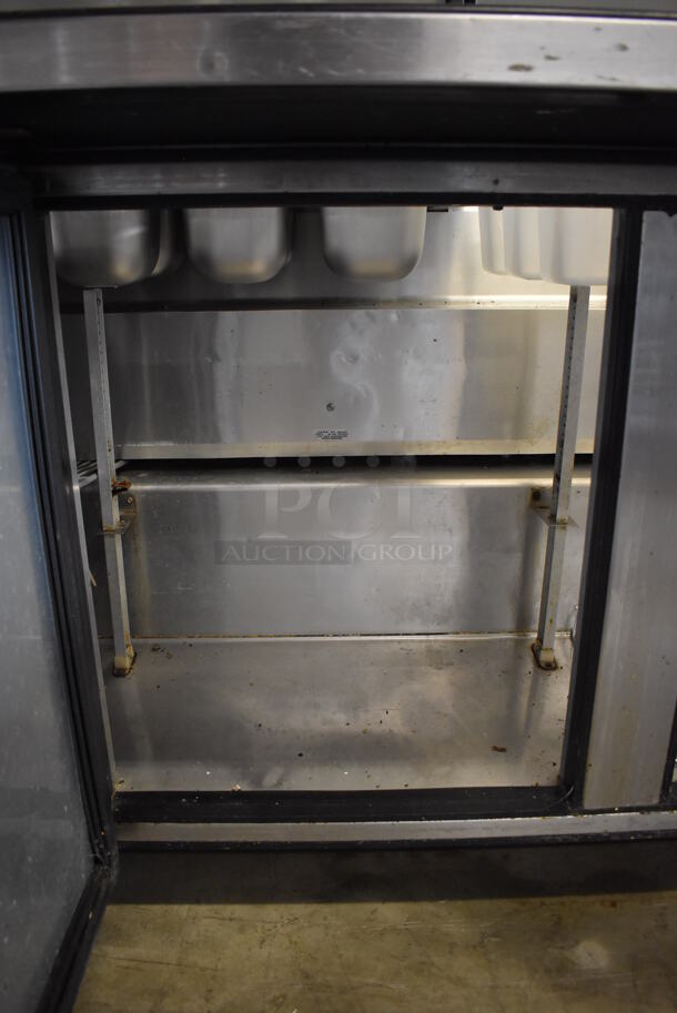 2015 True TSSU-72-30M-B-ST Stainless Steel Commercial Pizza Prep Table on Commercial Casters. 115 Volts, 1 Phase. 72x34.5x46. Tested and Working! - Image 8 of 10