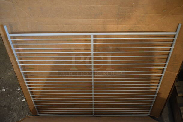 BRAND NEW IN BOX! Gray Poly Coated Rack. 26.5x24.5x0.5