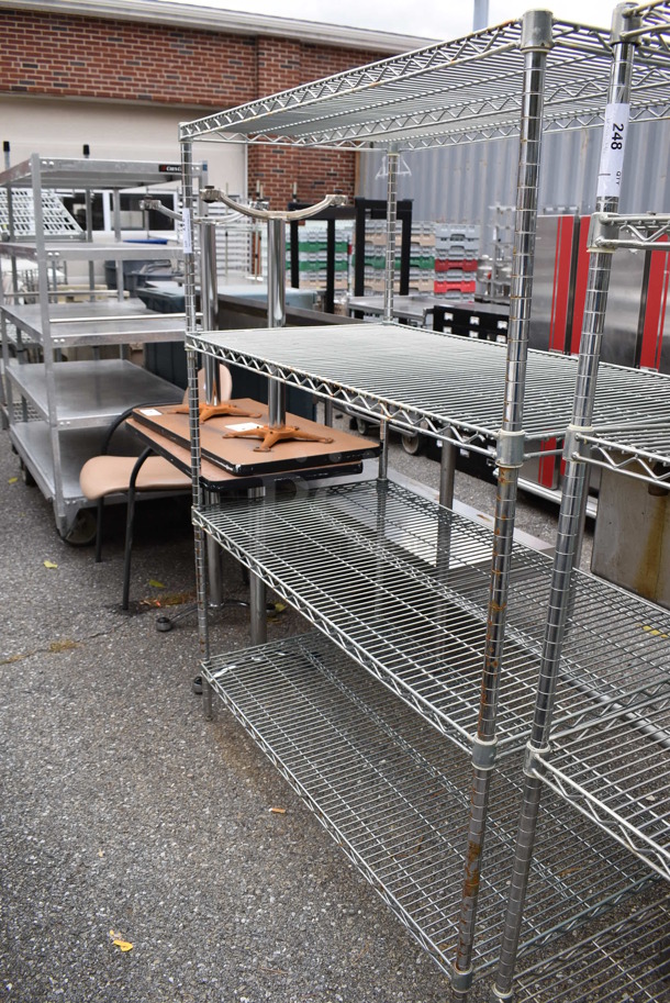Chrome Finish 4 Tier Wire Shelving Unit. BUYER MUST DISMANTLE. PCI CANNOT DISMANTLE FOR SHIPPING. PLEASE CONSIDER FREIGHT CHARGES. 48x24x63 - Image 1 of 2