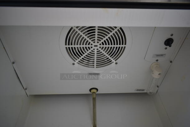 True T-19 Stainless Steel Commercial Single Door Reach In Cooler w/ Poly Coated Racks and Commercial Casters. 115 Volts, 1 Phase. Tested and Powers On But Does Not Get Cold - Image 7 of 8