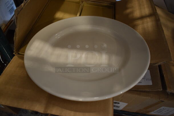 12 BRAND NEW IN BOX! Tuxton Reno TRE-016 White Ceramic Plates. 10.5x10.5x1. 12 Times Your Bid!
