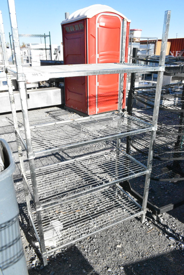 Chrome Finish 4 Tier Wire Shelving Unit. BUYER MUST DISMANTLE. PCI CANNOT DISMANTLE FOR SHIPPING. PLEASE CONSIDER FREIGHT CHARGES. - Image 1 of 1