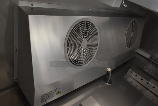 BRAND NEW SCRATCH AND DENT! 2023 Avantco 178SS3FHC Stainless Steel Commercial 3 Door Reach In Freezer w/ Poly Coated Racks on Commercial Casters. 115 Volts, 1 Phase. Tested and Working! - Image 9 of 11