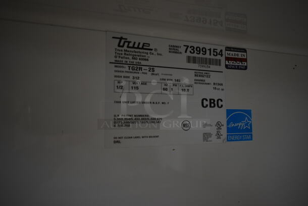 2012 True TG2R-2S ENERGY STAR Stainless Steel Commercial 2 Door Reach In Cooler w/ Poly Coated Racks on Commercial Casters. 115 Volts, 1 Phase. Tested and Working! - Image 6 of 7