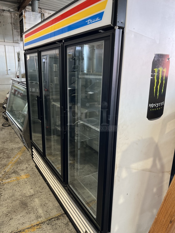 True GDM-72F Metal Commercial 3 Door Reach In Freezer Merchandiser w/ Poly Coated Racks. 115/208/230 Volts, 1 Phase. 78x32x82 - Image 1 of 8