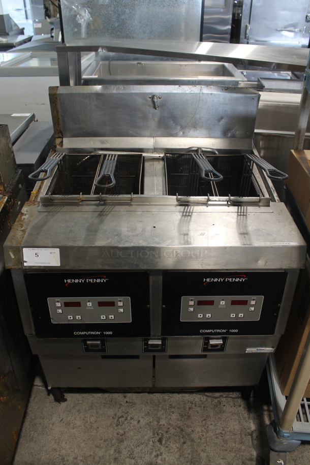 Henny Penny OFG-322 Stainless Steel Commercial Floor Style Propane Gas Powered 2 Bay Deep Fat Fryer w/ 4 Metal Fry Baskets. 170,000 BTU. - Image 1 of 8