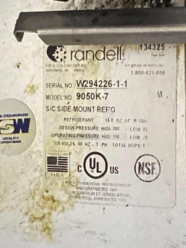 Randell Stainless Steel Dual-Sided Refridgerated Work Island, Multi-Pan Prep Table W/Two -Door and Two Drawers  Refrigerated Storage. Tested And Working. 84 x  46/52 x 58.
 - Image 10 of 11