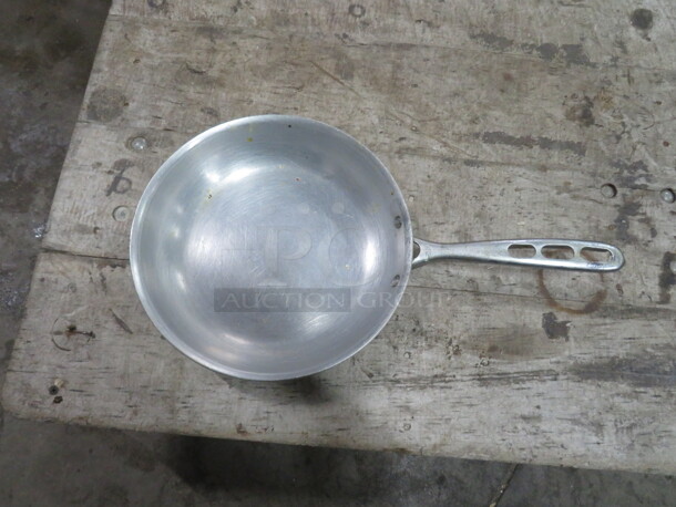 One Aluminum Vollrath 10 Inch Skillet. #67110 - Image 1 of 2