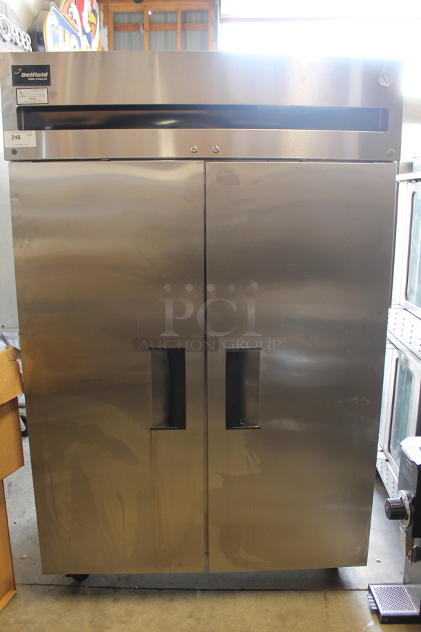 Delfield 6000 XL Stainless Steel Commercial 2 Door Reach In Cooler w/ Poly Coated Racks on Commercial Casters. Tested and Powers On But Does Not Get Cold - Image 2 of 5