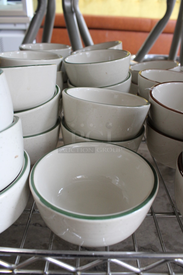 12 White Ceramic Bowls w/ Green Line on Rim. 4.5x4.5x2.5. 12 Times Your Bid!