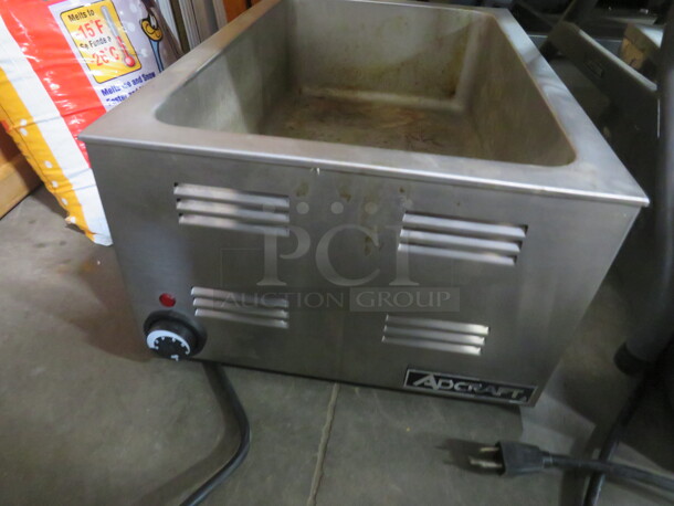 One Adcraft Food Warmer. 120 Volt. Model# FW-1200WF. 14X24X9 - Image 1 of 1