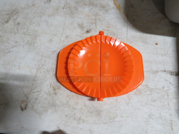 One Empanada Press. - Image 1 of 2