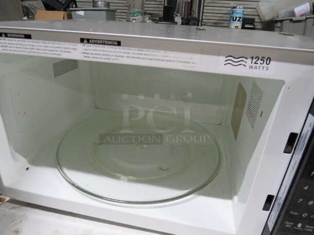 One Panasonic Inverter Microwave. 1250 Watt. #NN-T94SSFX. 24X18X13. - Image 2 of 2