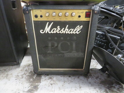 One Marshall Lead 12 Amp.