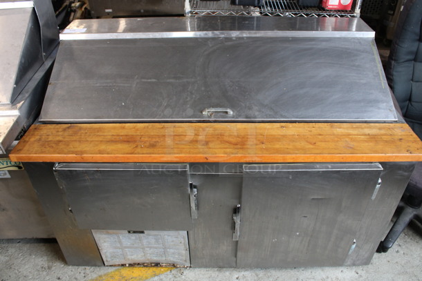Stainless Steel Commercial Sandwich Salad Prep Table Bain Marie Mega Top w/ Butcher Block Cutting Board. 60x32x41. Tested and Powers On But Temps at 53 Degrees