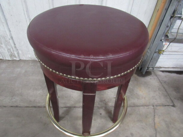 Wooden Bar Stool With A Red Cushioned Seat With Nail Head Trim And Footrest. 2XBID - Image 1 of 2