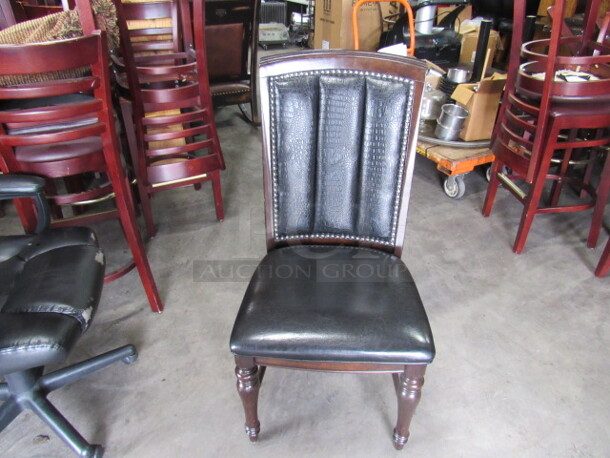 Wooden Chair With Black Cushioned Seat And Back, With Nail Head Trim. 2XBID