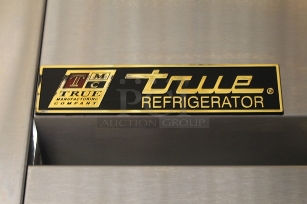 2014 True TG2R-2S ENERGY STAR Stainless Steel Commercial 2 Door Reach In Cooler w/ Poly Coated Racks on Commercial Casters. 115 Volts, 1 Phase. Tested and Working! - Image 2 of 6