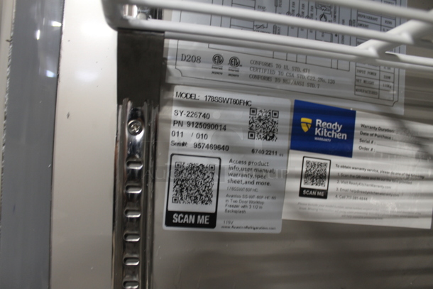 BRAND NEW SCRATCH AND DENT!  Avantco 178SSWT60FHC Commercial Stainless Steel Two Door Worktop Freezer With Backsplash, Polycoated Racks And Commercial Casters. 115V. Tested and Working! - Image 6 of 8