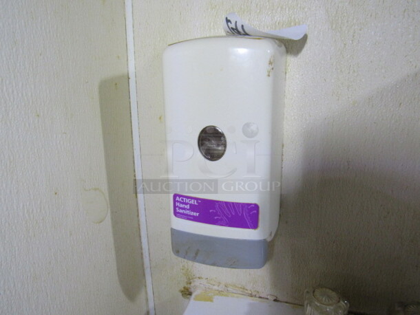 One Wall Mount Soap Dispenser. BUYER MUST REMOVE!