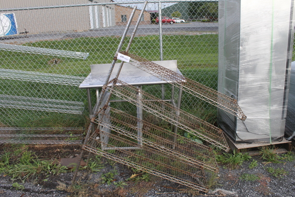 Chrome Finish 4 Tier Wire Shelving Unit on 2 Poles. BUYER MUST DISMANTLE. PCI CANNOT DISMANTLE FOR SHIPPING. PLEASE CONSIDER FREIGHT CHARGES. - Image 1 of 2