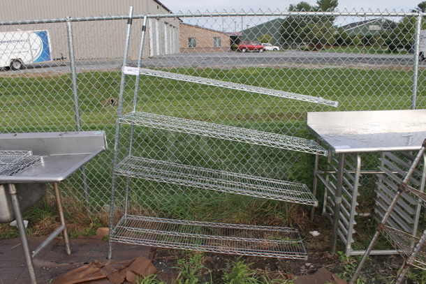 Chrome Finish 4 Tier Wire Shelving Unit on 2 Poles. BUYER MUST DISMANTLE. PCI CANNOT DISMANTLE FOR SHIPPING. PLEASE CONSIDER FREIGHT CHARGES. - Image 1 of 2