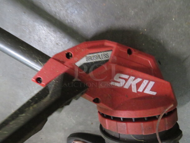 One Skil Brushless Power Core 40 Weedeater With Battery And Charger. - Image 2 of 3